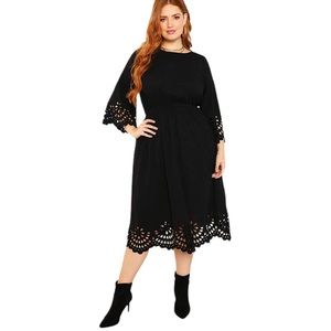 Black Dress with Sleeve and Skirt Cutouts